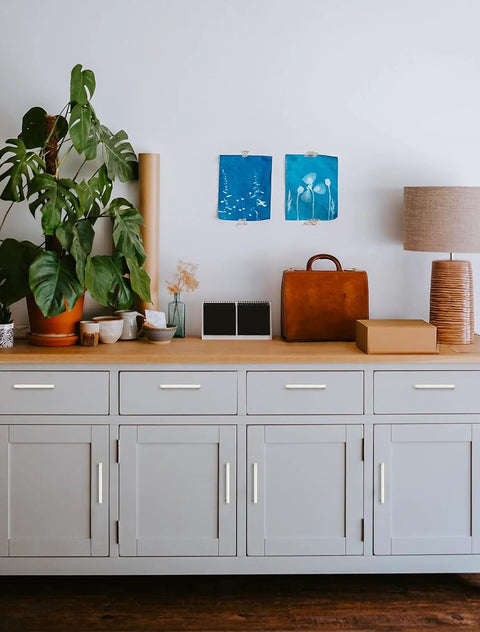 25 Pack Solid 5 Inch Square Kitchen Cabinet Handles in Brushed Nickel Pulls installed on white cabinet in modern setting