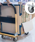Heavy Duty Swivel Caster Wheels 2 Pack Locking Castors on yellow cart with cardboard boxes, ideal for utility carts.