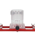 Zunate wood trimmer router base on red metal frame with clear plastic housing and black adjustment knob