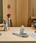 Heavy Duty Plastic Glue Stick Organizer Stand With Deep Trenches For Hot Melt Adhesive Pens on a wooden workbench.