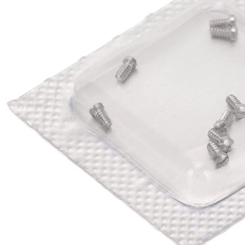 Pro Grade Stainless Steel Micro Watch Repair Screws Heavy Duty Back Cover Fasteners Zero Hassle Clock Maintenance Lock Secure With Precision Female Thread 1X1.3X2.4Mm Complete Eight Piece Kit showing screws in a transparent packaging.