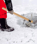 Person using 2 In 1 Garden Pickaxe And Mattock Tool 16 Inch Stainless Steel Hatchet Axe in snow for ice breaking outdoor DIY