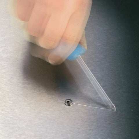 Close-up of a hand using a screwdriver from the Advent Calendar 2025 For Tool Nerds And Gearheads 28 Piece Screwdriving Kit