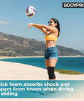Person wearing protective knee pads with thick foam padding for maximum cushioning and collision avoidance knee sleeve.