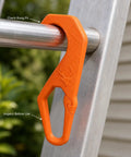 Orange Ladder Hook For Wall Painting And Home Maintenance Hang Paint Cans And Small Tools On A Ladder Rung With A Curved Top Over The Rung And A Lower Opening For Quick DIY Fixes And Clean Worksite Organization. orange ladder hook on aluminum rung, orange plastic