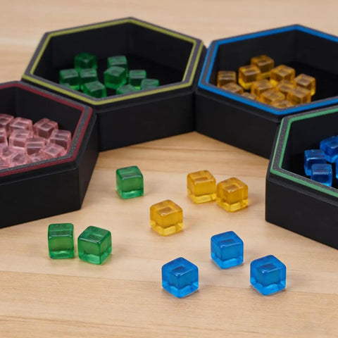 Hexagonal Magnetic Board Game Tray Organizer Set With Flexible Layouts 7 Pack in black with colorful dice pieces visible.