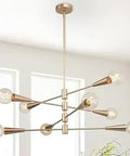 Dark Gold Sputnik Chandelier With Eight Light Heads, 31 Inch Adjustable Mid Century Modern Pendant Light For Dining Room Kitchen And Living Room, Dope Crystal Accents in room setting