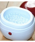 Portable Ultrasonic Denture And Retainer Cleaner Case With Automatic Wash Feature and Built In Filter for compact cleaning.