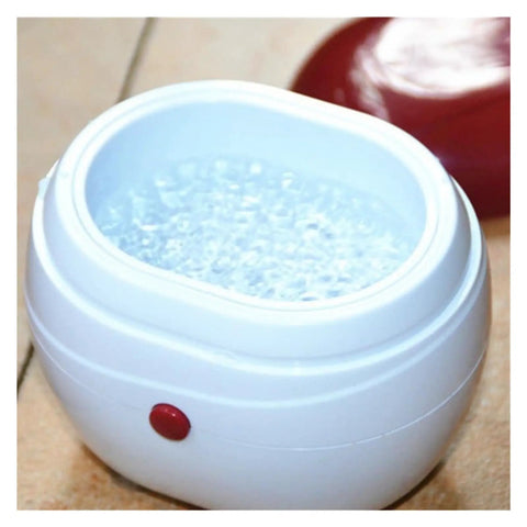 Portable Ultrasonic Denture And Retainer Cleaner Case With Automatic Wash Feature and Built In Filter for compact cleaning.
