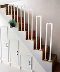 Heavy Duty Wrought Iron Staircase Handrail U Shaped Non Slip Safety Rail Built Tough For Indoor Or Outdoor Rooms Holds Four Forty Pounds Like An Absolute Champ with white pipes on wooden stairs.