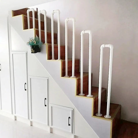 Heavy Duty Wrought Iron Staircase Handrail U Shaped Non Slip Safety Rail Built Tough For Indoor Or Outdoor Rooms Holds Four Forty Pounds Like An Absolute Champ with white pipes on wooden stairs.