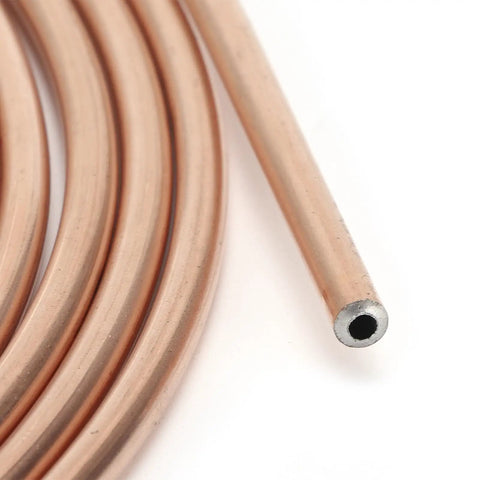 Close-up of 3/16 Inch Copper Plated Brake Line Tubing 25 Foot Flexible Coil Roll With 0.028 Inch Wall Durable For Hydraulic Braking