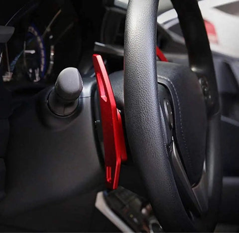 Side view of Aluminum Paddle Shifter Kit for Toyota Camry 2012-2016 and Corolla 2014-2018 installed on a steering wheel.