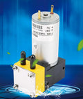 Compact Mini Diaphragm Vacuum Pump 24V DC Pulling Dead Simple Suction At One Liter Per Minute Plug And Go Setup with yellow connection.