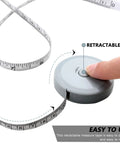 Close-up of finger pressing a button on Mini Retractable Tape Measure 3 Pack With Soft Fabric Sewing Ruler On The Go Pocket Size Dual Sided 150 CM Tailor Measuring Tapes For Body Measurements Craft Knitting And Sewing Projects.