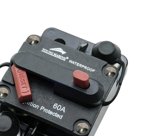 Young Marine waterproof 60A surface-mount circuit breaker for boat trolling motors, front view with red reset button.