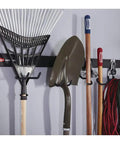 Wall-mounted garage rail with FastTrack Wall Double S Hook 2 Handle Garage Tool Organizer Rack, holding rake and shovel