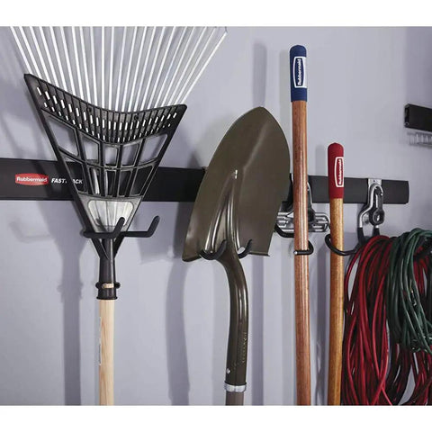 Wall-mounted garage rail with FastTrack Wall Double S Hook 2 Handle Garage Tool Organizer Rack, holding rake and shovel
