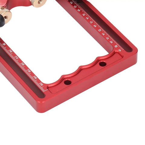 Close-up of a red aluminum frame with measurement markings from a Heavy Duty Table Saw Roller Stand With Aluminum Alloy Construction And Dual Wheel Bearing Roller For Pro Woodworking And Serious DIYers, Easy Setup, Maximum Stability, And Long Lasting Performance.