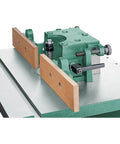 Built Like A Tank One Point Five Horsepower Woodworking Shaper Featuring Massive Twenty By Eighteen Inch Cast Iron Table And Dual Voltage Motor - close-up of shaper details.