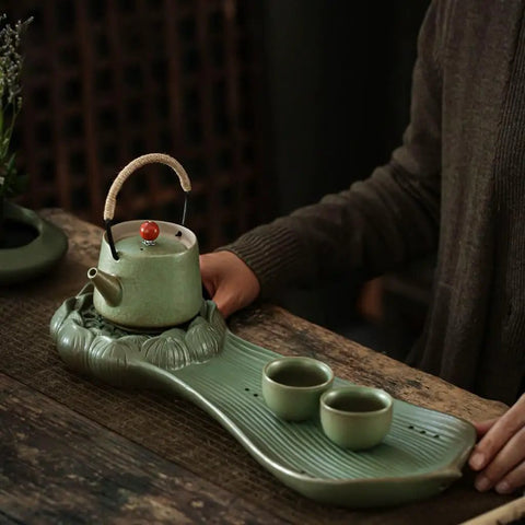 Top Shelf Glazed Ceramic Tea Tray With Retro Textured Finish No Fuss Dry Brewing Platform And Built In Drip Tray For Authentic Kung Fu Sets coffee table setup with tea pot and cups.
