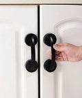 Black Suction Cup Glass Door And Window Handle on white kitchen cabinets