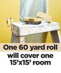 Contractor Grade Tan Masking Tape 0.7 Inch By 60.1 Yards One Roll on ladder with painted wall background
