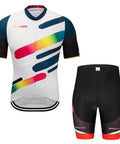 Cycling jersey and shorts set with colorful geometric design on white and black fabric background.