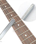 Guitar Luthier Tool Kit With Double Headed Fret Hammer Crowning File Fret Rocker Stainless Steel Tools being used on guitar neck