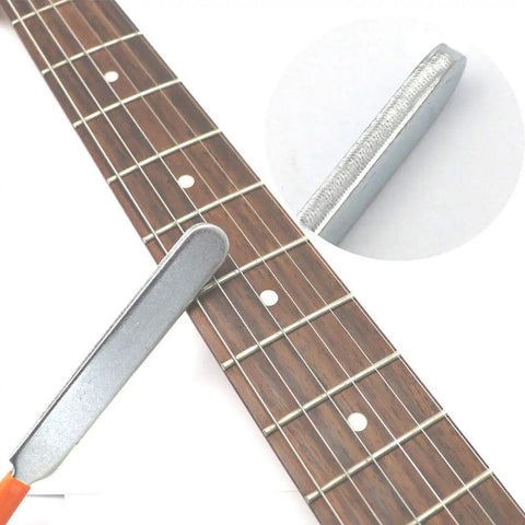 Guitar Luthier Tool Kit With Double Headed Fret Hammer Crowning File Fret Rocker Stainless Steel Tools being used on guitar neck