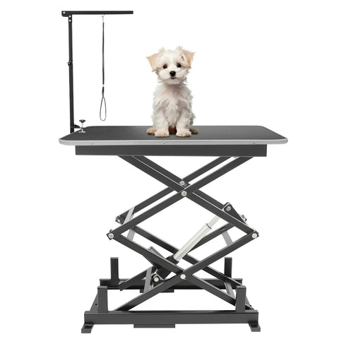 Sturdy Scissor Lift Table With Remote Control Adjustable Platform Handles 180 Lbs for Easy Material Transport In Factories Warehouses And Cold Storage with a small dog on top.