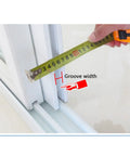 Measuring groove width with tape for Top Shelf Plastic Steel Door And Window Pulleys Sporting Double Grooved Wheels.