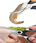 5-blade herb kitchen scissors with black-and-white handles cutting shrimp and greens