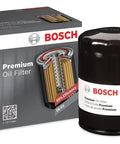 Premium Oil Filter With FilTech Filtration Technology Delivers Superior Engine Protection And Long Lasting Performance Compatible With Chevrolet Ford Honda Infiniti Kia Mazda Mercury MG Nissan And More next to packaging box