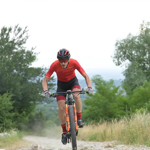 Cyclist on trail using Pedal Based MTB Power Meter With Left Sensor Pro Grade Extra Cleats SPD Cleats Included