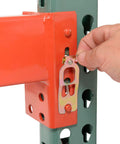 Heavy Duty Teardrop Pallet Rack Add On Unit Built Like A Tank For Quick Tool Free Assembly And High Capacity Warehouse Storage 96 Inches Wide By 36 Deep By 96 Tall close-up of assembly pin being inserted.