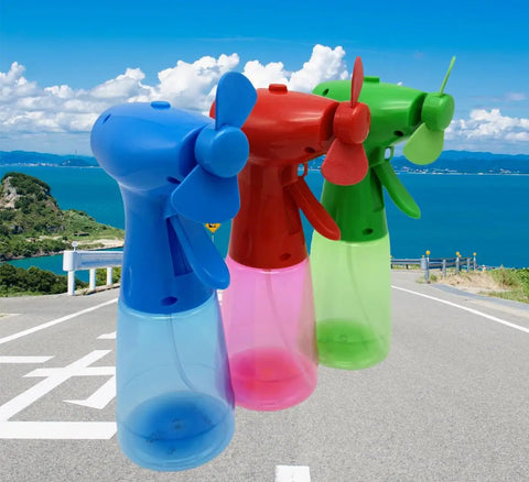 Three Pack Portable Misting Fan Instant Chill Airflow Battery Powered Compact Cooler For Camping Office Park in blue, red, green.