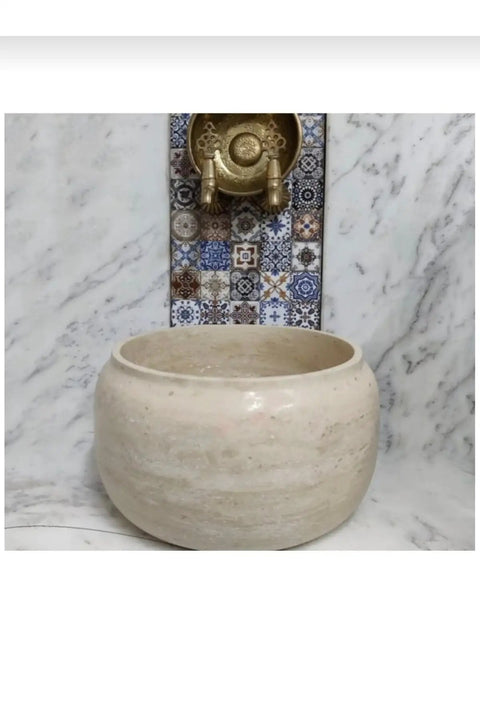 Travertine Marble Hammam Basin 16.5 x 9.8 inches Modern Oval Design for Bathroom Spa and Turkish Bath Use Stone Sink Durable and refined Beige Color, close-up view.