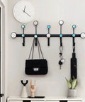 Heavy Hitter Wall Mounted Coat Hooks With Sleek Gold Iron Finish For Holding Coats Hats Keys And Jackets Super Sturdy No Fuss Setup Modern Bedroom Entryway Smart Storage Rack with bags and accessories hanging.