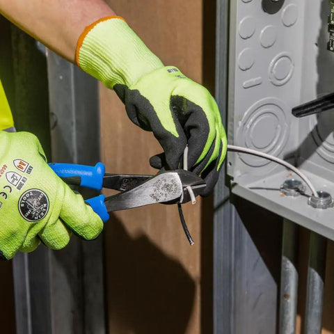 Worker using Heavy Duty 8 Inch Diagonal Cutting Pliers With Angled Head For Tight Spaces High Leverage Cutter Powers Through ACSR Screws