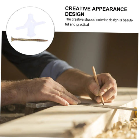 Close-up of hands using pencil and ruler with Aircraft Expansion Plug Nails Drywall Repair Kit 100 Pack Wall Fixer in focus