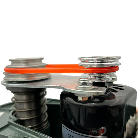 Close-up of Compact Benchtop Drill Press With Three Speeds 5000, 6500 And 8500 RPM showing belt mechanism for drilling precision.