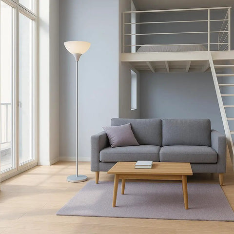 Dope Silver Torchiere Floor Lamp With White Opal Shade Modern Standing Fixture For Living Room Bedroom Or Office 72 Inch Tall E26 Base Compatible Soft Easy On The Eyes Lighting standing next to a gray sofa and wooden coffee table in a modern living room setting.