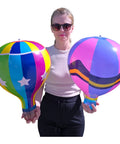 Person holding Multicolor 18 Inch Inflatable Hot Air Balloons Set With 3 Designs 3 Pack For Kids Parties Party Favors