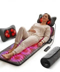 Woman using Full Body Massage Mat With Heat And Shiatsu Vibration for bed, chair, and recliner, showcasing relaxing features.