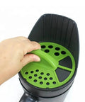 Close-up of hand adjusting seed hole size on 8 In 1 Hand Held Seed Spreader And Planter Tool With Fertilizer Dispenser Seed Hole Maker