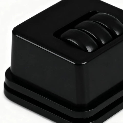 Furniture Casters Heavy-Duty Roller, close-up view of black caster wheel assembly with three smooth rollers.