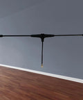 915MHz FPV Antenna For ELRS EP1 RX IPEX1 And TBS Tracer RC Systems 40mm Compact Long Range Drone Antenna in a room.