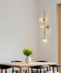 Chic Three Light Globe Glass Wall Sconces With Amber Glass Shades Mid Century Modern Indoor Wall Light Fixtures in dining room