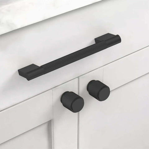 Professional Grade Matte Black Knurled Cabinet Handles, 10 Pack 5 Inch Kitchen Drawer Pulls on white cabinetry surface.